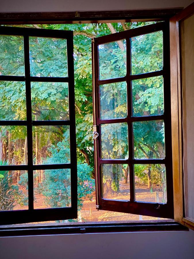 Suíte com Vista do Jardim